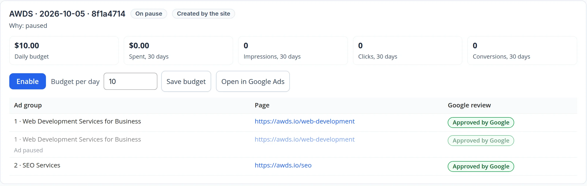 Campaign created by the site, on pause: daily budget $10.00, spend $0.00 over 30 days, buttons Enable, Save budget and Open in Google Ads; ad groups Web Development Services for Business and SEO Services are approved by Google, the earlier ad of the first group is paused